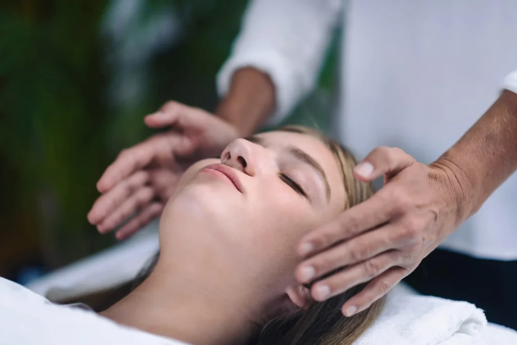 reiki healing treatment with teenage girl.jpg
